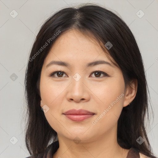 Joyful asian young-adult female with medium  brown hair and brown eyes