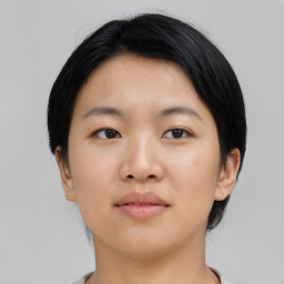 Neutral asian young-adult female with short  black hair and brown eyes