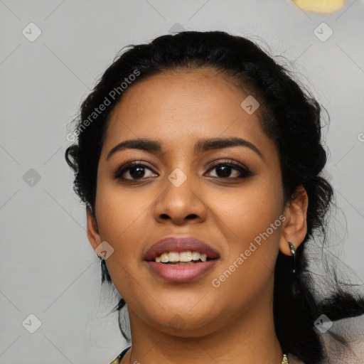 Joyful latino young-adult female with long  black hair and brown eyes