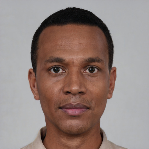 Neutral black adult male with short  black hair and brown eyes