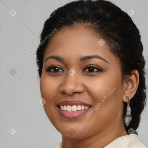 Joyful latino young-adult female with long  brown hair and brown eyes