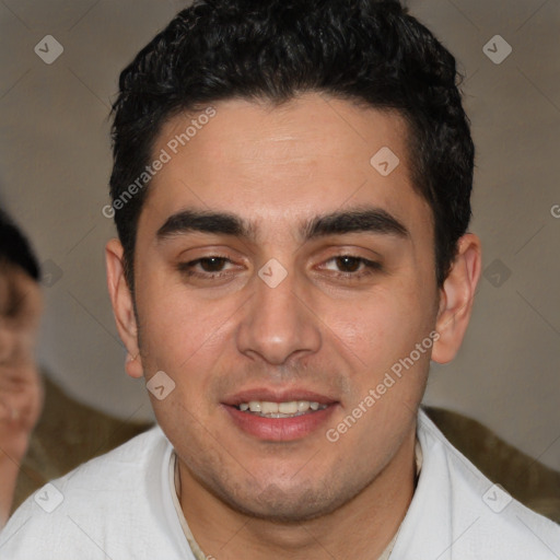 Joyful white young-adult male with short  black hair and brown eyes