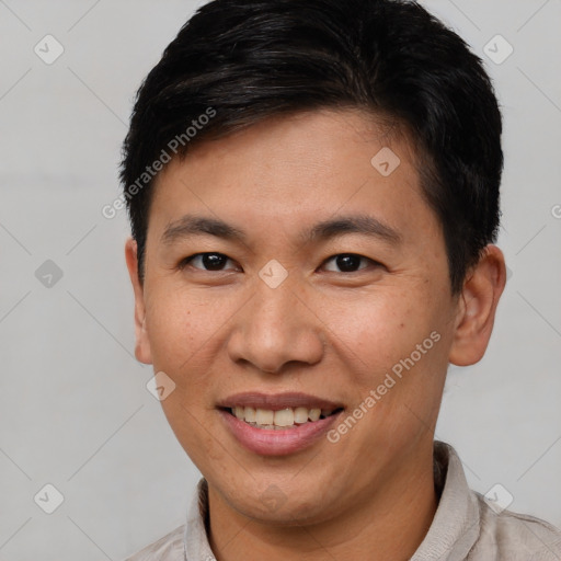 Joyful white young-adult male with short  brown hair and brown eyes