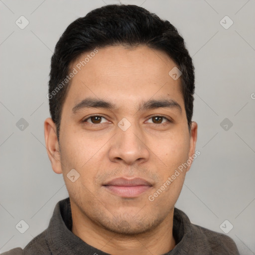 Joyful white young-adult male with short  black hair and brown eyes