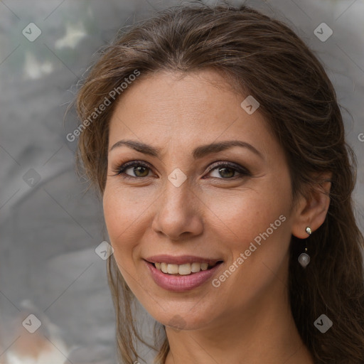 Joyful white adult female with medium  brown hair and brown eyes