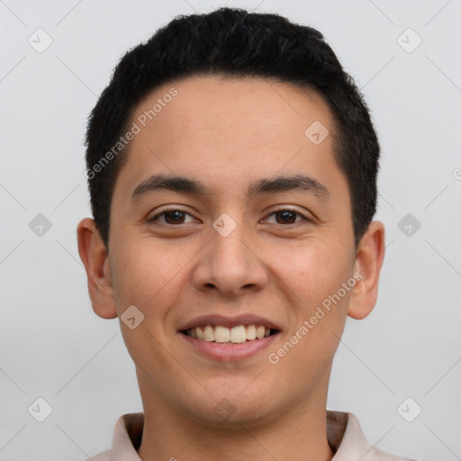 Joyful latino young-adult male with short  brown hair and brown eyes