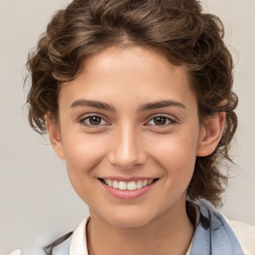 Joyful white child female with medium  brown hair and brown eyes