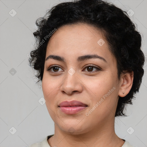 Joyful latino young-adult female with short  brown hair and brown eyes