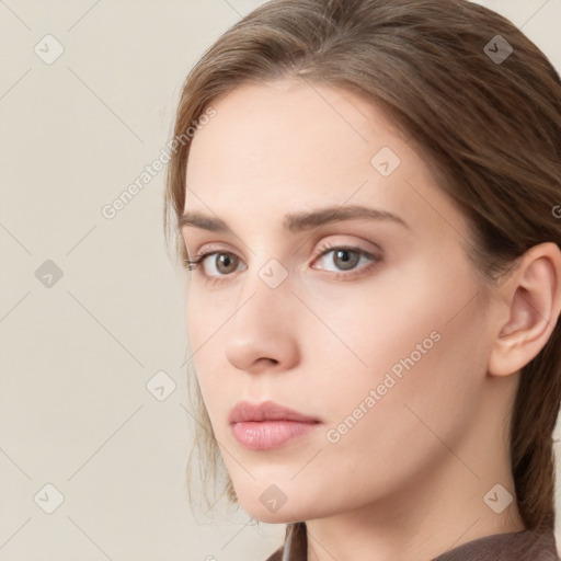 Neutral white young-adult female with long  brown hair and blue eyes