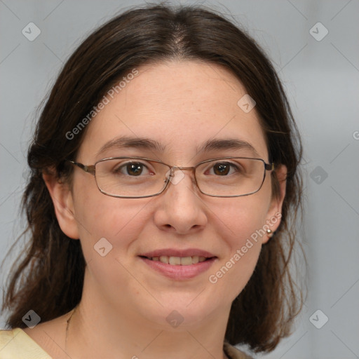 Joyful white adult female with medium  brown hair and brown eyes