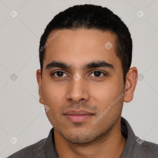 Neutral latino young-adult male with short  black hair and brown eyes