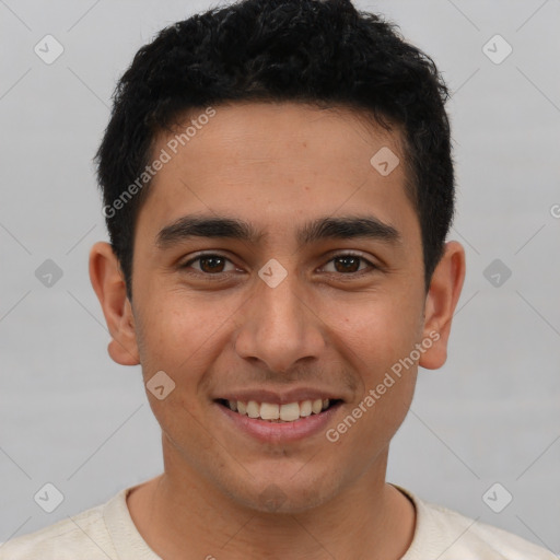 Joyful latino young-adult male with short  brown hair and brown eyes