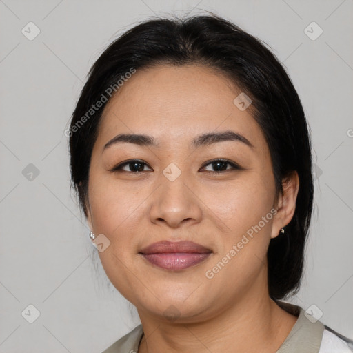 Joyful latino young-adult female with medium  black hair and brown eyes