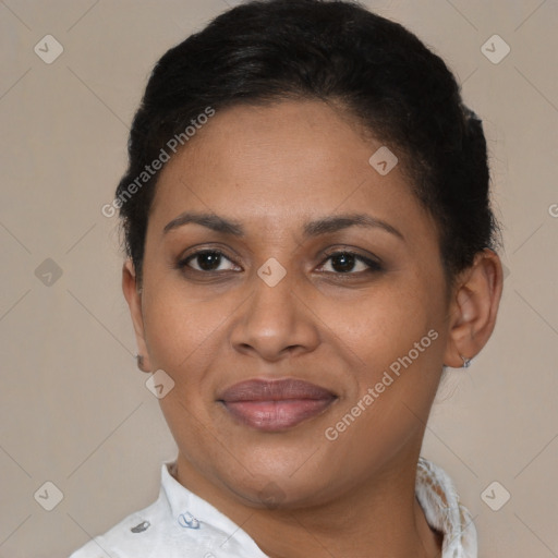 Joyful latino young-adult female with short  brown hair and brown eyes