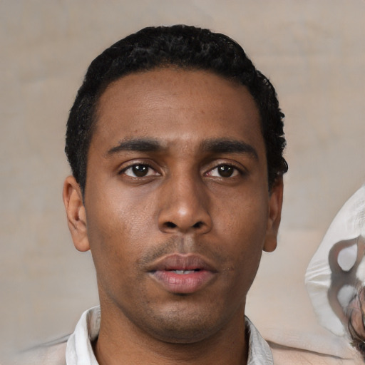 Neutral latino young-adult male with short  black hair and brown eyes
