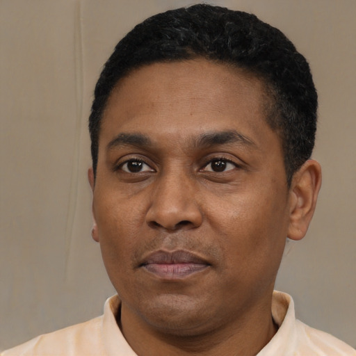 Neutral latino adult male with short  black hair and brown eyes