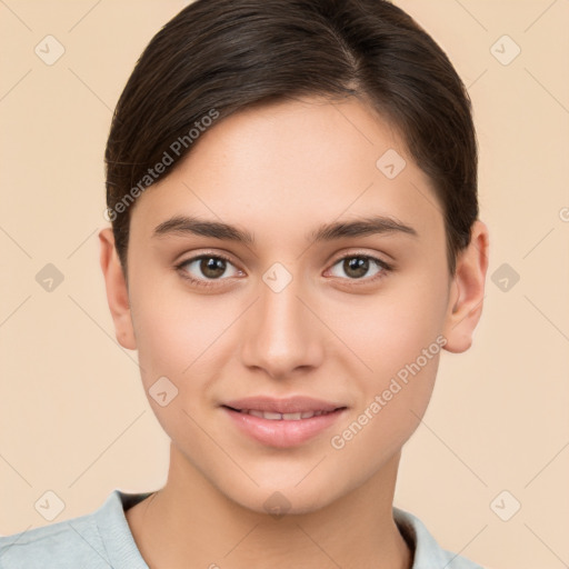 Joyful white young-adult female with short  brown hair and brown eyes