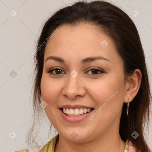 Joyful white young-adult female with medium  brown hair and brown eyes