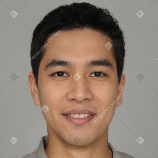 Joyful white young-adult male with short  black hair and brown eyes