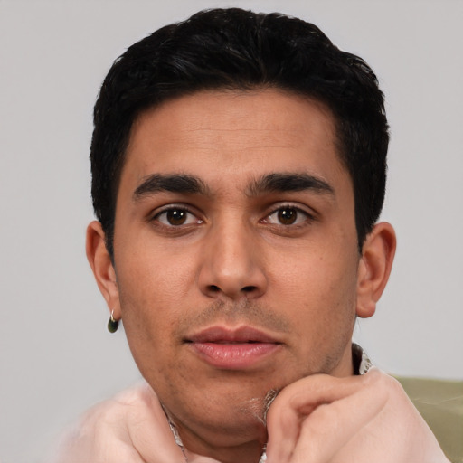 Neutral latino young-adult male with short  black hair and brown eyes