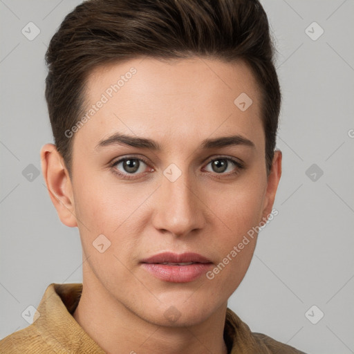 Joyful white young-adult female with short  brown hair and grey eyes