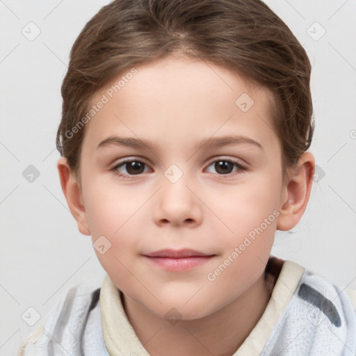 Joyful white child female with short  brown hair and brown eyes