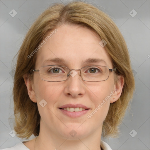 Joyful white adult female with medium  brown hair and blue eyes