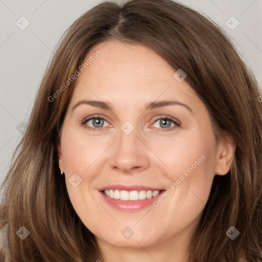 Joyful white young-adult female with long  brown hair and grey eyes