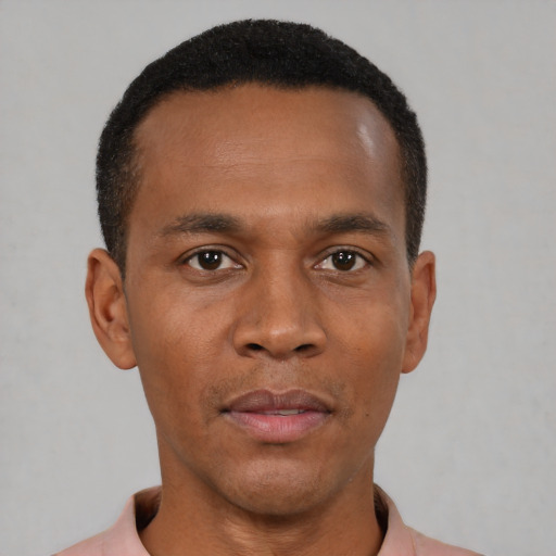 Neutral black young-adult male with short  black hair and brown eyes