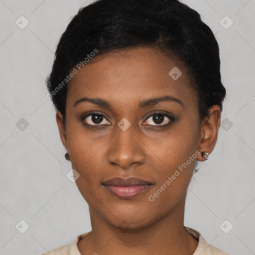 Neutral black young-adult female with short  black hair and brown eyes