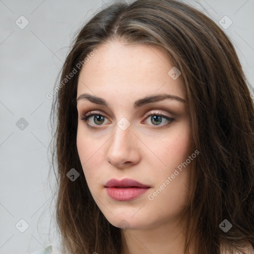 Neutral white young-adult female with long  brown hair and brown eyes