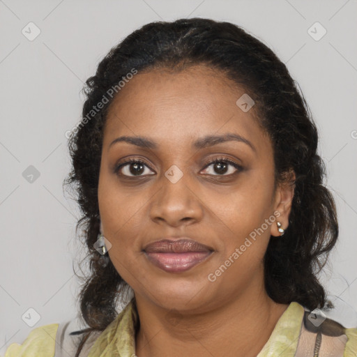 Joyful black adult female with medium  black hair and brown eyes