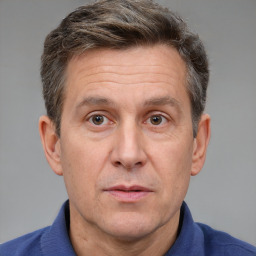 Neutral white adult male with short  brown hair and brown eyes