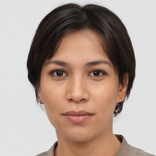 Neutral white young-adult female with medium  brown hair and brown eyes