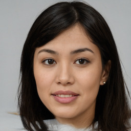 Joyful asian young-adult female with medium  brown hair and brown eyes