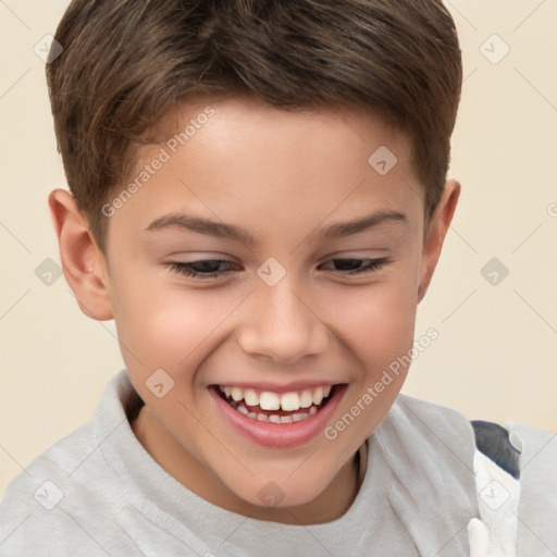 Joyful white child male with short  brown hair and brown eyes