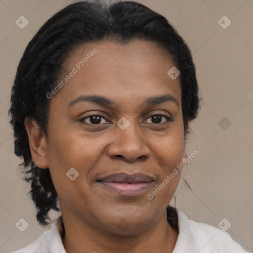 Joyful latino adult female with short  black hair and brown eyes