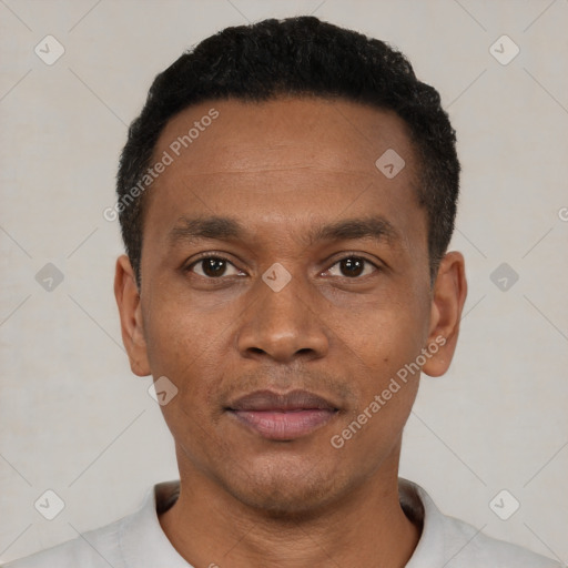 Neutral latino young-adult male with short  black hair and brown eyes
