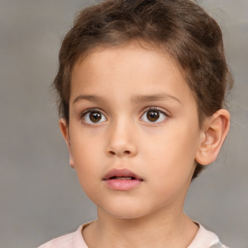 Neutral white child female with short  brown hair and brown eyes