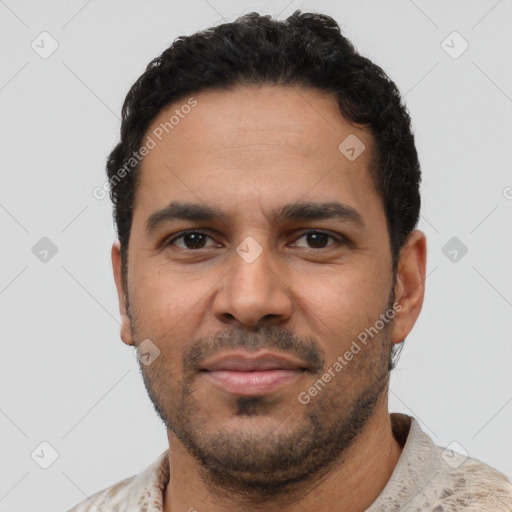 Neutral latino young-adult male with short  black hair and brown eyes