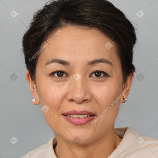 Joyful white adult female with short  brown hair and brown eyes