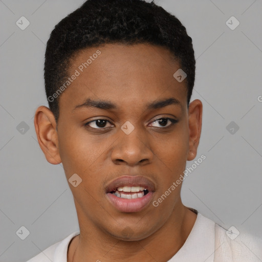 Joyful black young-adult male with short  black hair and brown eyes