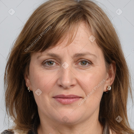 Joyful white adult female with medium  brown hair and grey eyes