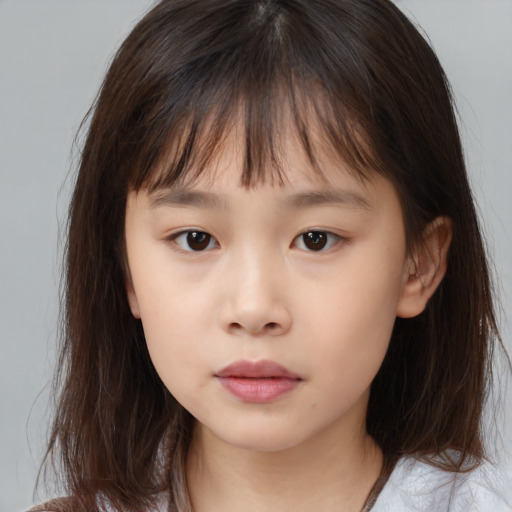 Neutral asian child female with medium  brown hair and brown eyes