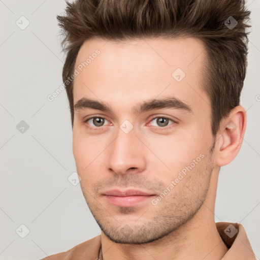 Neutral white young-adult male with short  brown hair and brown eyes