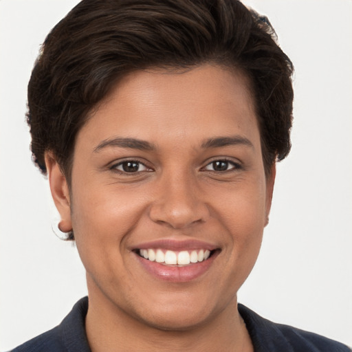 Joyful white young-adult female with short  brown hair and brown eyes