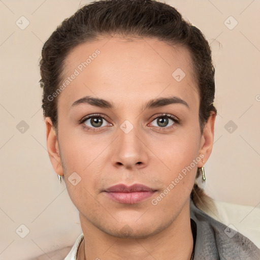 Neutral white young-adult female with short  brown hair and brown eyes