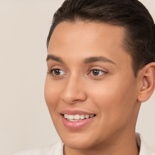 Joyful white young-adult female with short  brown hair and brown eyes