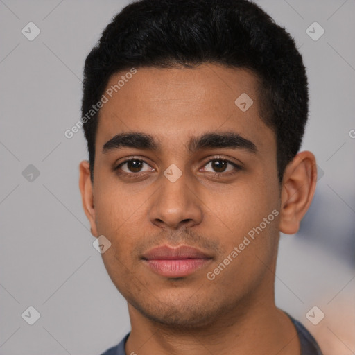 Neutral latino young-adult male with short  black hair and brown eyes