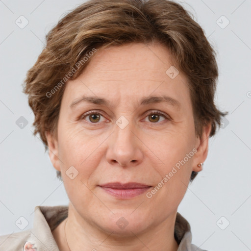 Joyful white adult female with short  brown hair and brown eyes